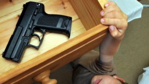kid-gun-drawer